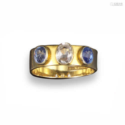 An Australian sapphire three stone ring by R H Parker, retailed by H Newman (1824 - 1913), the