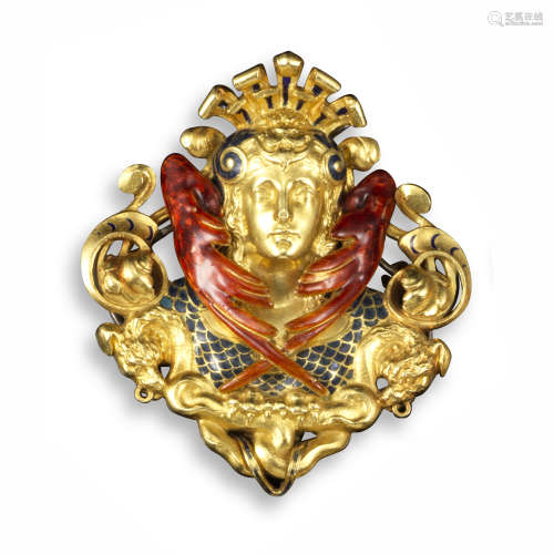 A gold revivalist brooch in the form of a stylised sphinx, wearing an elaborate head dress with