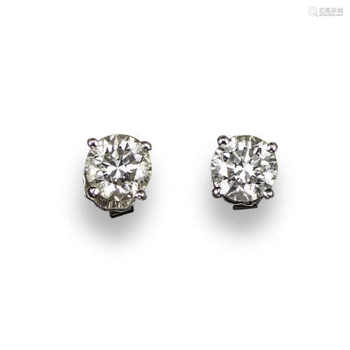 A pair of diamond stud earrings, the round brilliant-cut diamonds each weigh approximately 0.75cts