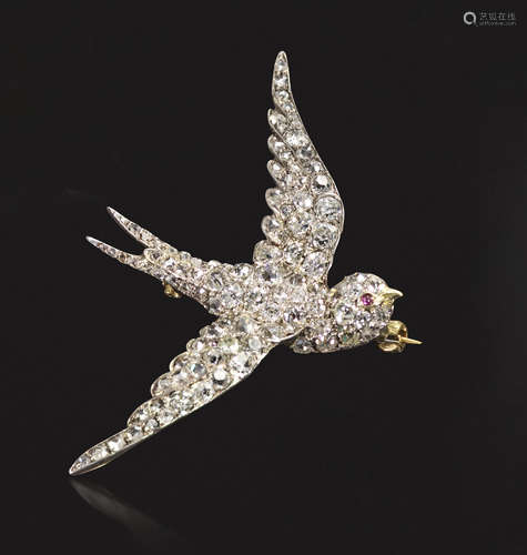 A late 19th century diamond swallow brooch, realistically formed and pave-set with graduated