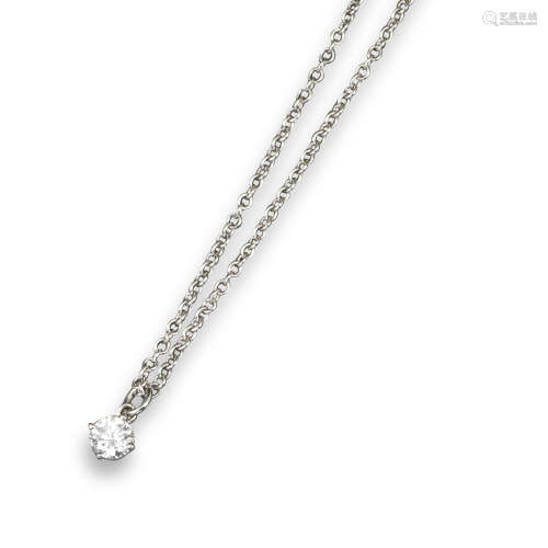 A diamond pendant, the round brilliant-cut diamond weighs approximately 0.45cts and is claw-set in