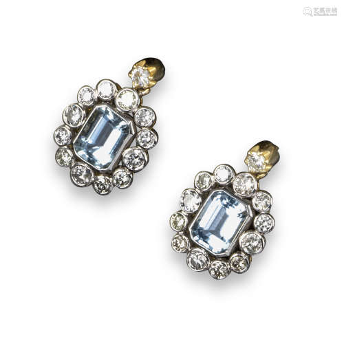 A pair of aquamarine and diamond drop earrings, the emerald-cut aquamarines are set within a