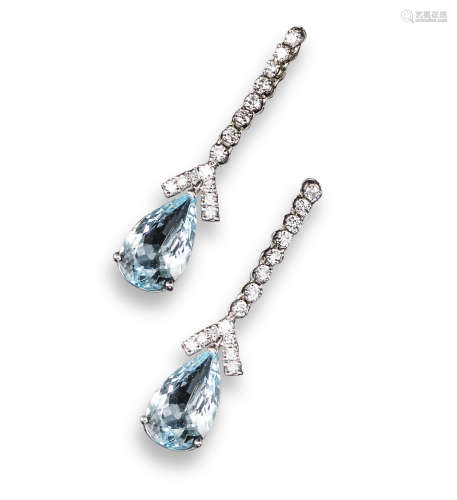 A pair of aquamarine and diamond drop earrings, each pear-shaped aquamarine is set below a diamond-