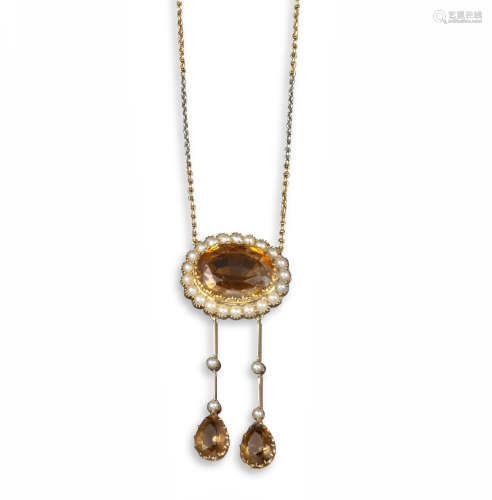 An Edwardian citrine and pearl pendant, the oval-shaped citrine is set within a surround of half