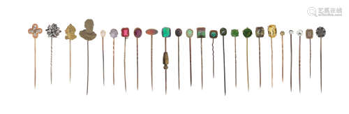 Twenty-four assorted stick pins, one set with an old circular-cut yellow diamond, a star sapphire,