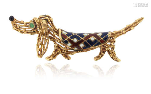 A gold Dachshund brooch, the stylised dog with an enamel jacket set in textured 18ct yellow gold,