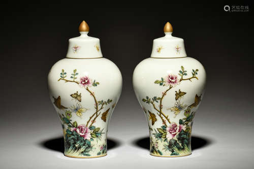 PAIR OF FAMILLE ROSE 'FLOWERS AND BUTTERFLIES' VASES WITH COVER