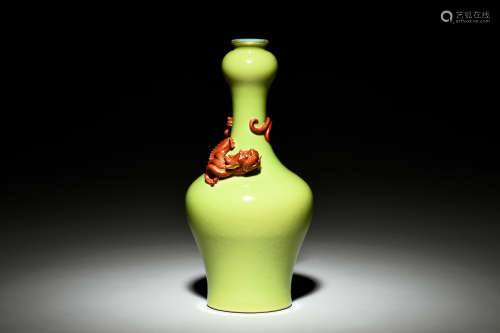 A CARVED YELLOW-GLAZED DRAGON VASE