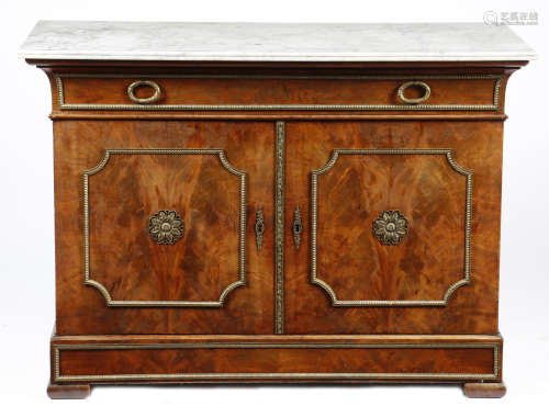 A Charles X mahogany commode a vantaux by Jean Jacques Werner, with ormolu mounts, the Carrara