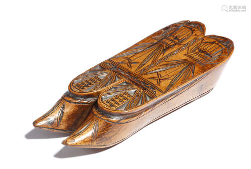 A 19th century treen chip carved double shoe snuff box, the sliding cover decorated with a pair of