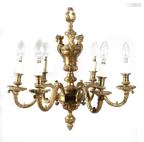 A French gilt bronze chandelier in Regence style, the urn stem applied with female term figures,