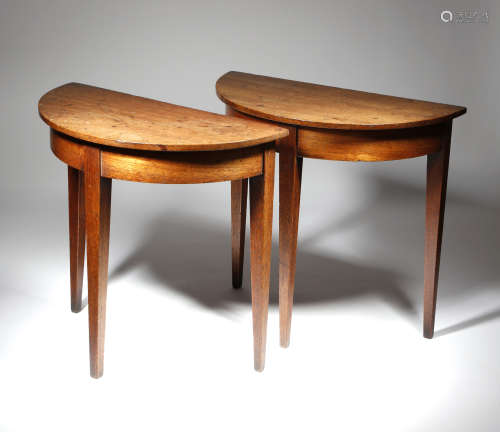 A rare pair of George III mahogany miniature demi-lune side tables, on square tapering legs, 42cm