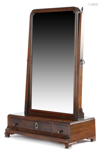 A George II walnut dressing table mirror, the later bevelled plate within a moulded frame, with