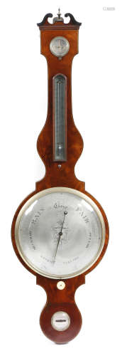 A George IV mahogany wheel barometer, inlaid with boxwood and ebonised stringing, the glazed 12in