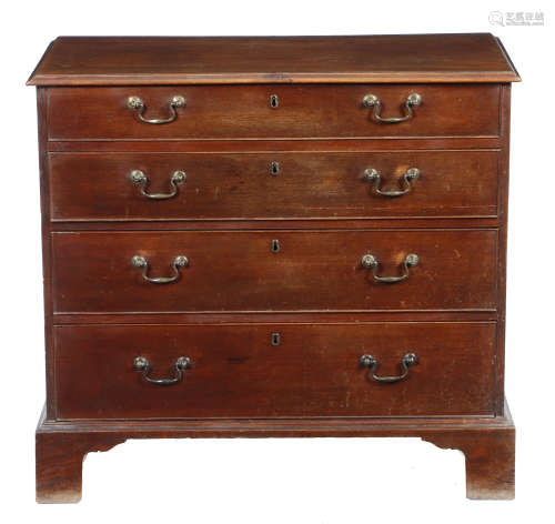 A George III mahogany chest, the top with an applied moulded edge, above four long graduated drawers