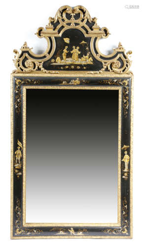 A black japanned and gilt wall mirror in early 18th century style, the rectangular plate within a