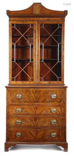 A late George III mahogany secretaire bookcase, inlaid with stringing, the detachable pagoda shape