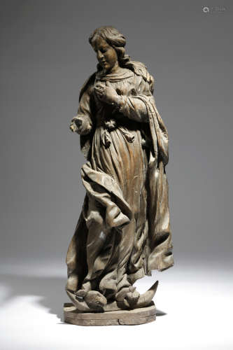 A large 17th century German carved limewood figure of the Virgin of the Immaculate Conception,
