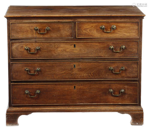 A George III mahogany chest, the top with a moulded edge, above two short and three long graduated