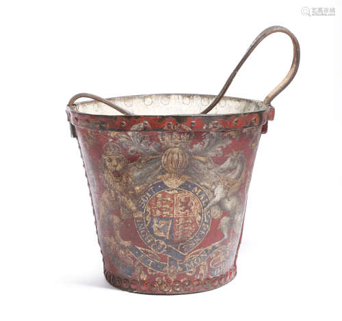 An early 19th century leather fire bucket, painted with the Royal Coat of Arms, on a red ground,