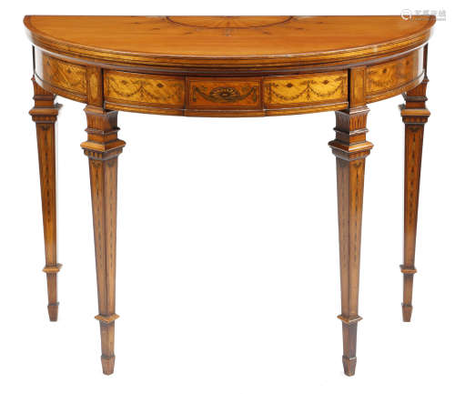 A late Victorian satinwood and marquetry demi-lune card table by Filmer, the crossbanded fold-over