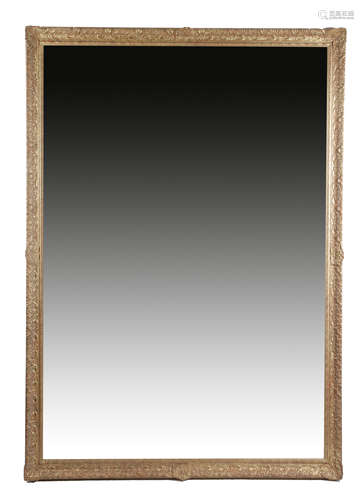 A large gilt composition wall mirror, the bevelled rectangular plate within a flower, shell and