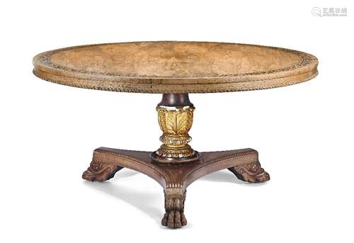 λ A Regency rosewood and brass mounted centre table in the manner of Morel and Seddon,