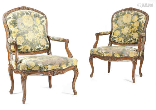A pair of Louis XV style beechwood fauteuil a la reine, each with a padded back, seat and