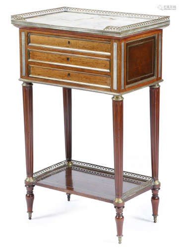 A 19th century French Directoire mahogany table en chiffoniere, with brass mounts, the pierced
