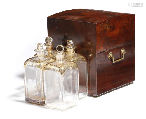 An early 19th century mahogany decanter box, with a mother of pearl escutcheon and a pair of brass