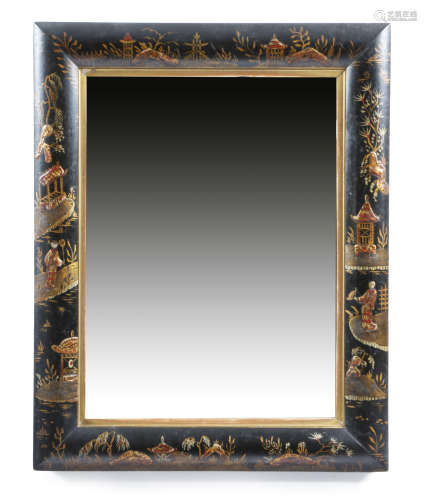 A black japanned wall mirror in early 18th century style, the rectangular bevelled plate within a