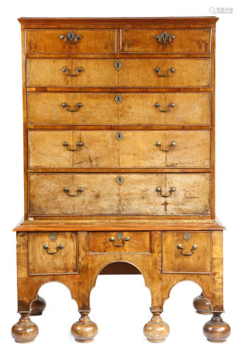 A George II and later walnut chest on stand, with two short and four long drawers, the stand