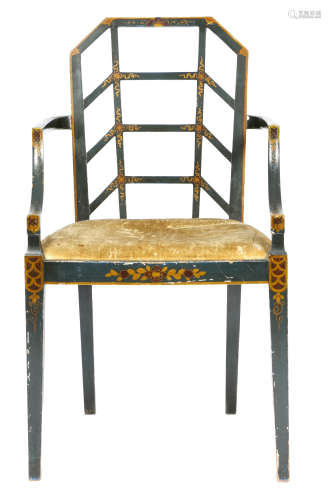 A blue painted cockpen open armchair in George III style, gilt painted with flowers.