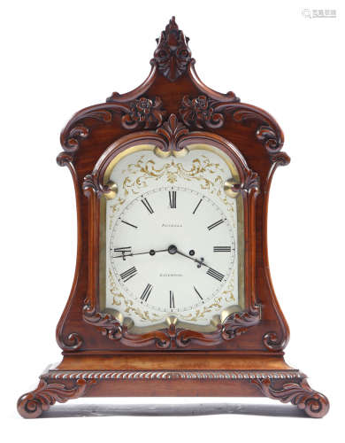 A George IV mahogany mantel clock by Roskell of Liverpool, the eight day brass movement with four