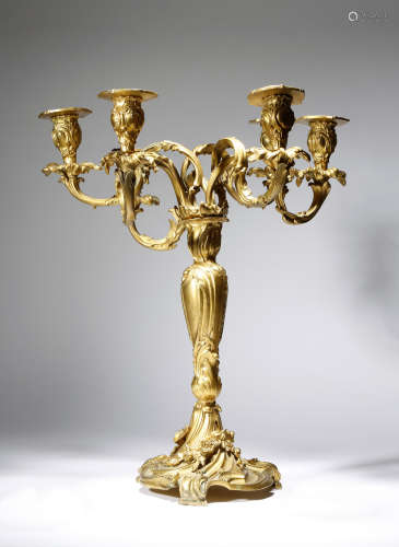 A 19th century French ormolu candelabrum in Louis XV style, in the manner of Meissonier, with a leaf