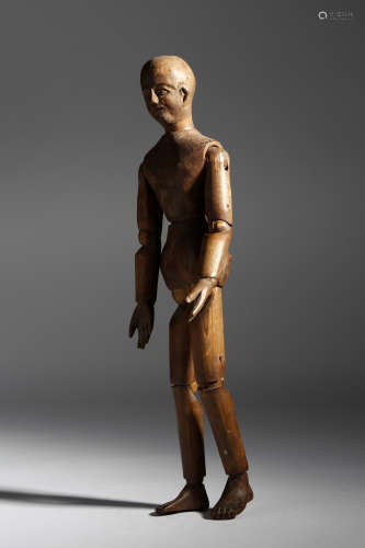 A late 19th century French pine artist's lay figure, with articulated arms and legs, with pencil