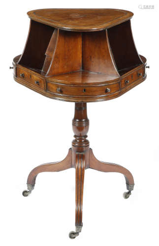 An unusual mahogany library bookstand in Regency style, the revolving top with three corner shelves,