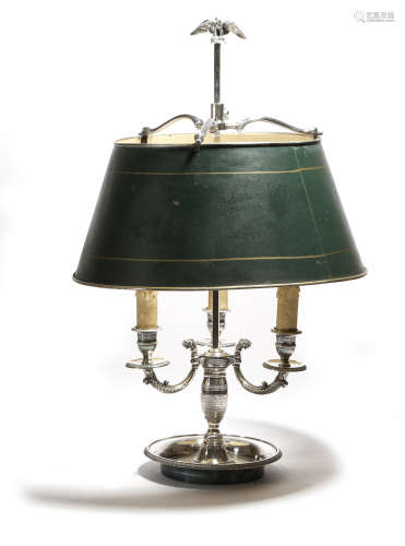 A French silver plated bouillotte lamp in Empire style, with an eagle finial above an adjustable