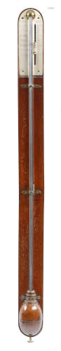 A George III mahogany stick barometer by Thomas Blunt of London, the arched silvered dial signed 'T.
