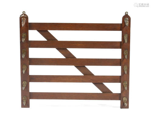 A late Victorian oak novelty stick rack by Swaine & Adeney, in the form of a five bar gate,