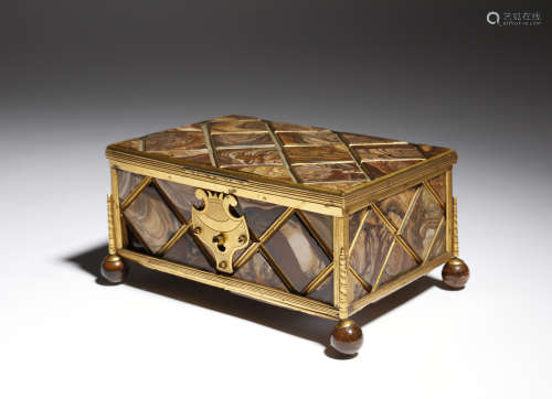 A 19th century agate and gilt metal mounted casket, decorated with lattice panels, on ball feet,