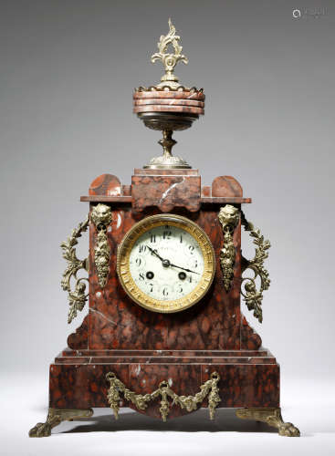 A late 19th century French rouge griotte marble mantel clock, the eight day brass cased drum
