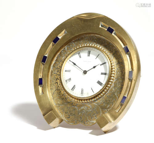 A novelty French brass clock, in the form of a horseshoe, the movement with a lever escapement and