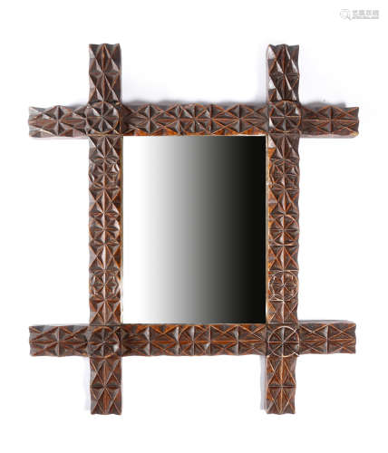 A Victorian folk art chip carved wall mirror, the rectangular plate within a painted frame to