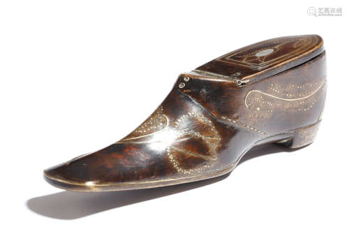 A 19th century treen snuff shoe, with brass tack inlay and decorated with a tulip and other flowers,