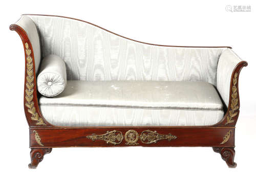 A Louis Philippe mahogany bateau style sofa, with gilt bronze mounts of laurel leaves, palmettes and