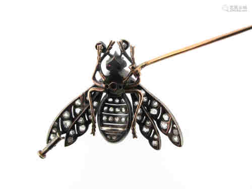 A Victorian diamond-set insect brooch, the realistically formed bee is pavé-set with rose-cut