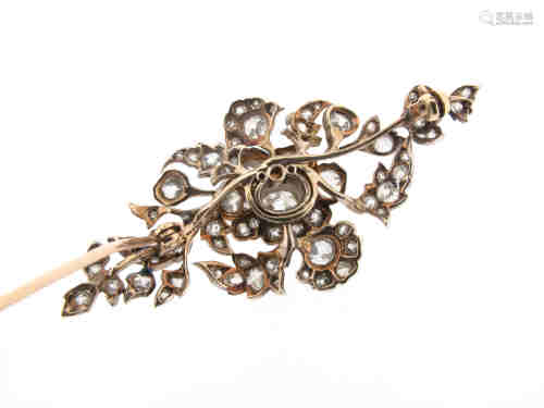 A late 19th century diamond foliate brooch, set overall with graduated cushion-shaped and oval-