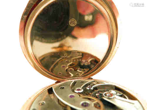 An 18ct gold open faced pocket watch, the white dial signed Paul Ditisheim, with black Arabic