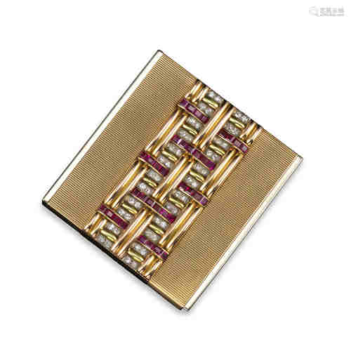 A French ruby and diamond compact, decorated with interwoven lines of rubies, diamonds and gold on